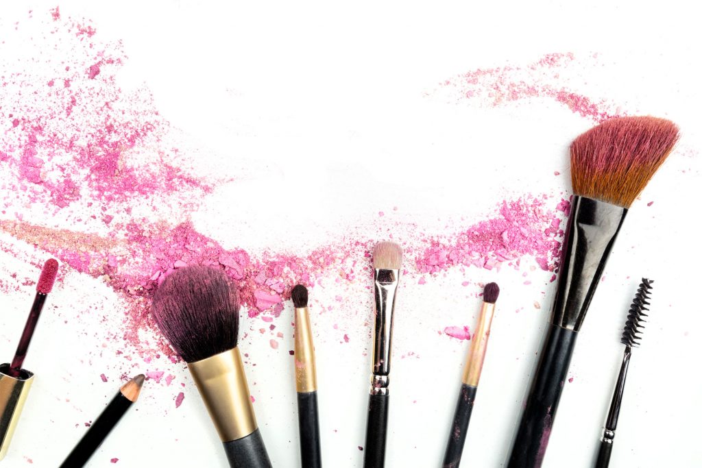 Austin TX Makeup Services, Makeup brushes fanned out over a white background